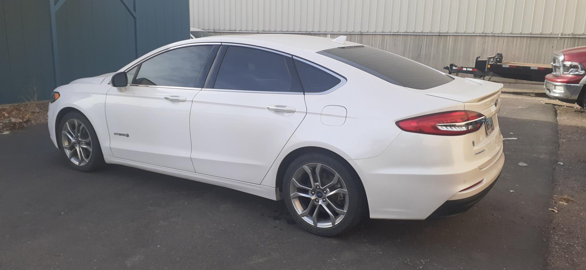 2019 Ford Fusion Hybrid Titanium (3FA6P0RU3KR) with an 2.0L L4 DOHC 16V HYBRID engine, CVT transmission, located at 2015 Cambell Street, Rapid City, SD, 57701, (605) 342-8326, 44.066433, -103.191772 - CARFAX AVAILABLE - Photo#10